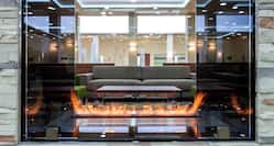 View of Lounge Seating Through Fireplace