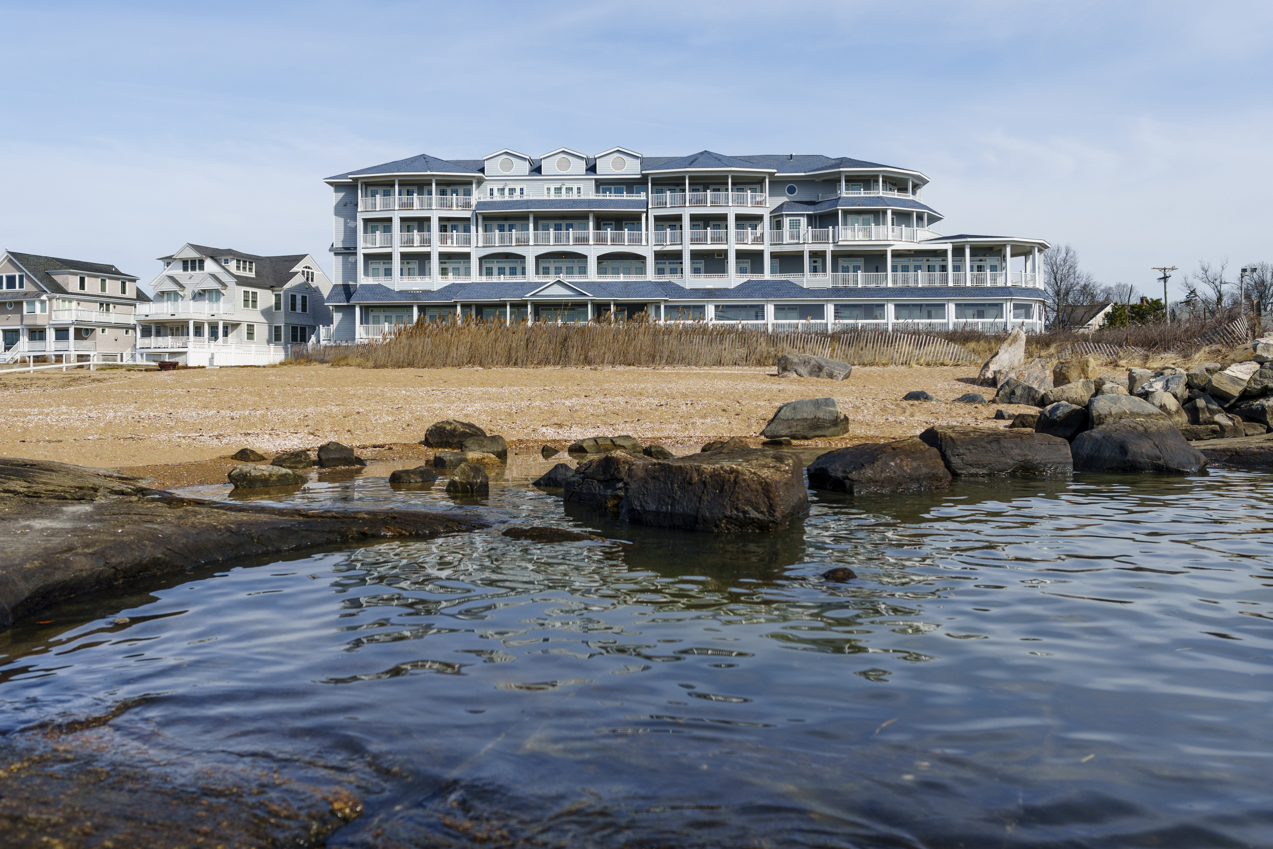 Hotel exterior with beach in foreground
