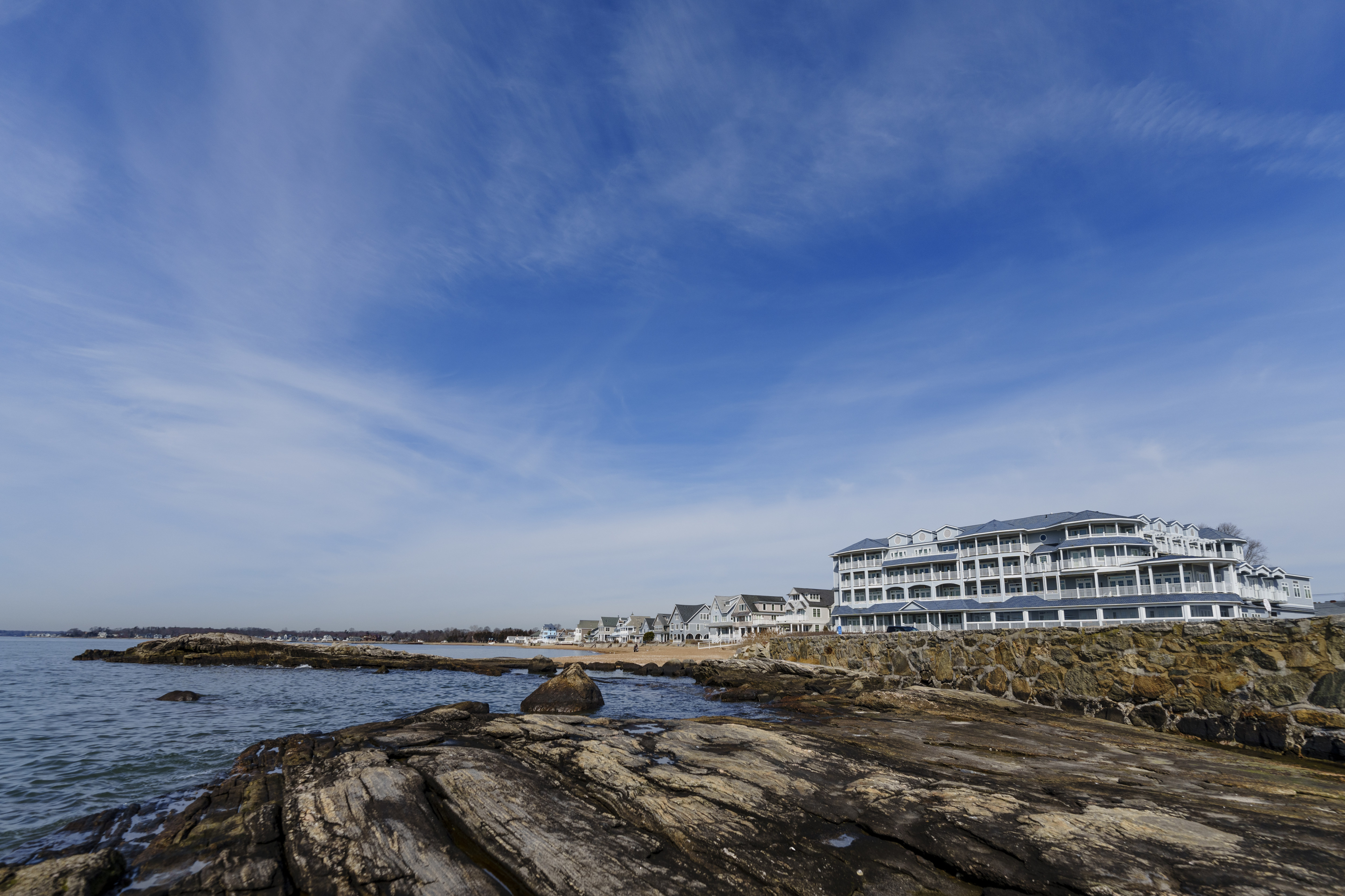Hotel exterior with rocky beach