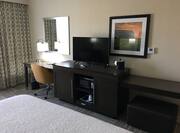 Work Desk and TV in Standard Guest Room with King-Sized Bed