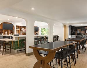 Modern and spacious bar with ample seating for guests