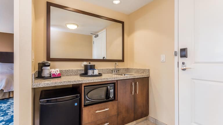 Suite Wet Bar Area with Microfridge and Coffee Supplies