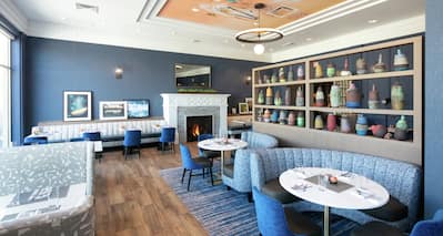 Audrey Kitchen and Bar with Soft Seating in Blue and White Tones