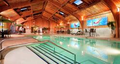 Indoor Pool Area with Hot Tub and Sauna