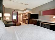 Studio Suite with Queen Bed, Work Desk, TV, Lounge Area, and Kitchen