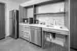 Guestroom Kitchen with Fridge and Microwave