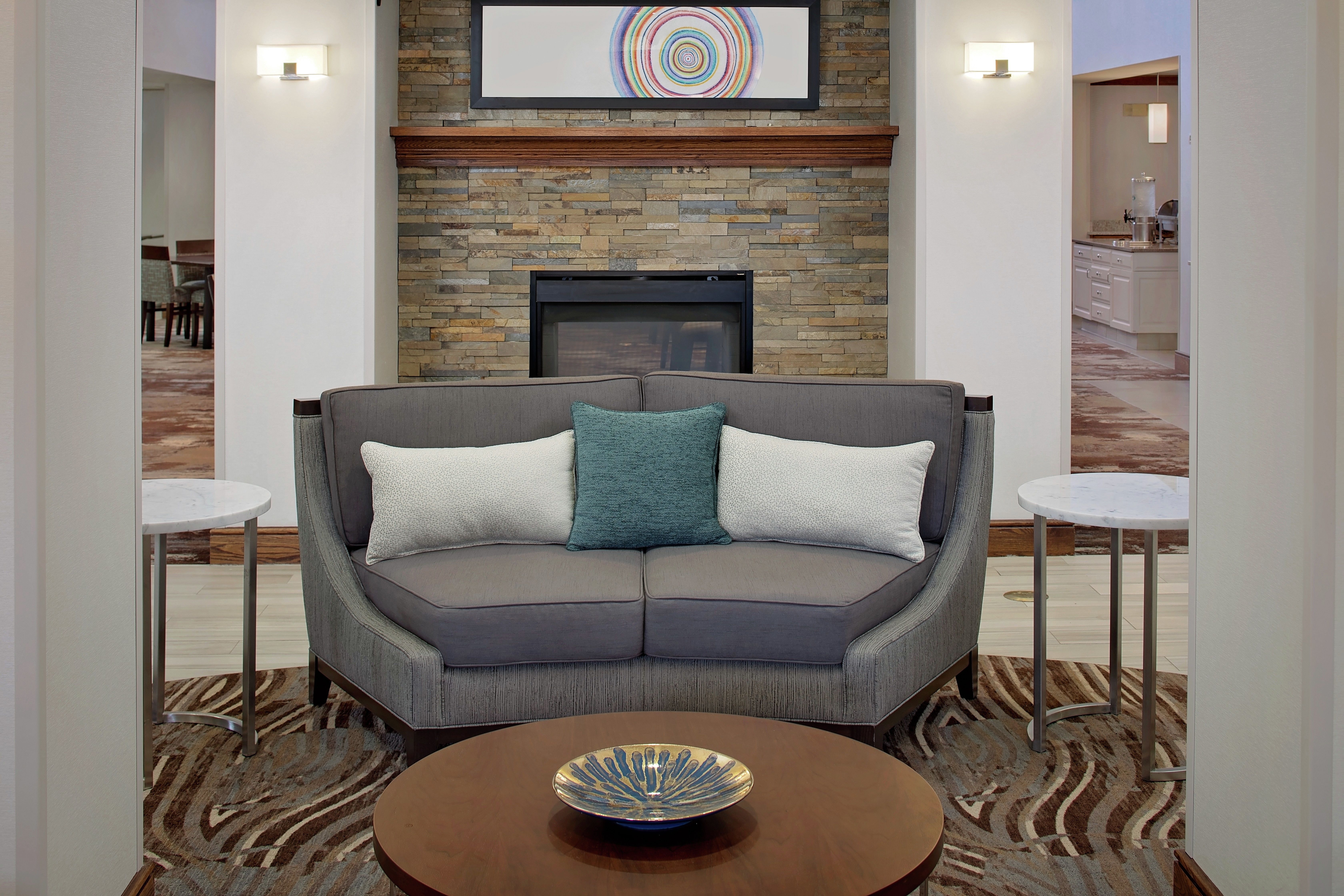 Couch by Fireplace in Lobby