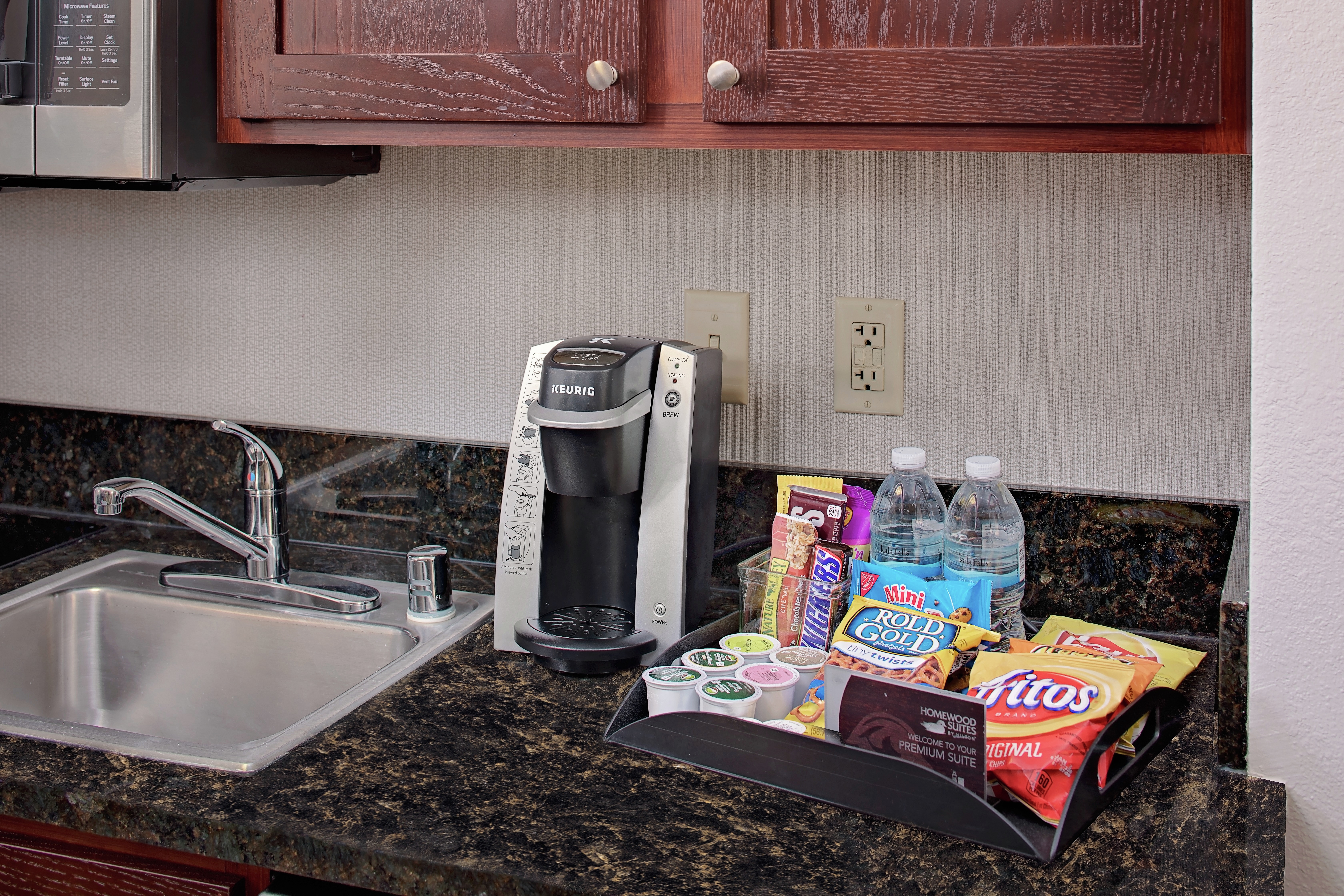 Snacks And Coffee Maker in a Hotel Room