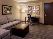 King Suite Living Room with Sofa, Work Desk and Television