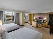 Deluxe Junior Suite with Two Queen Beds, Television, Lounge Seating and Outside View