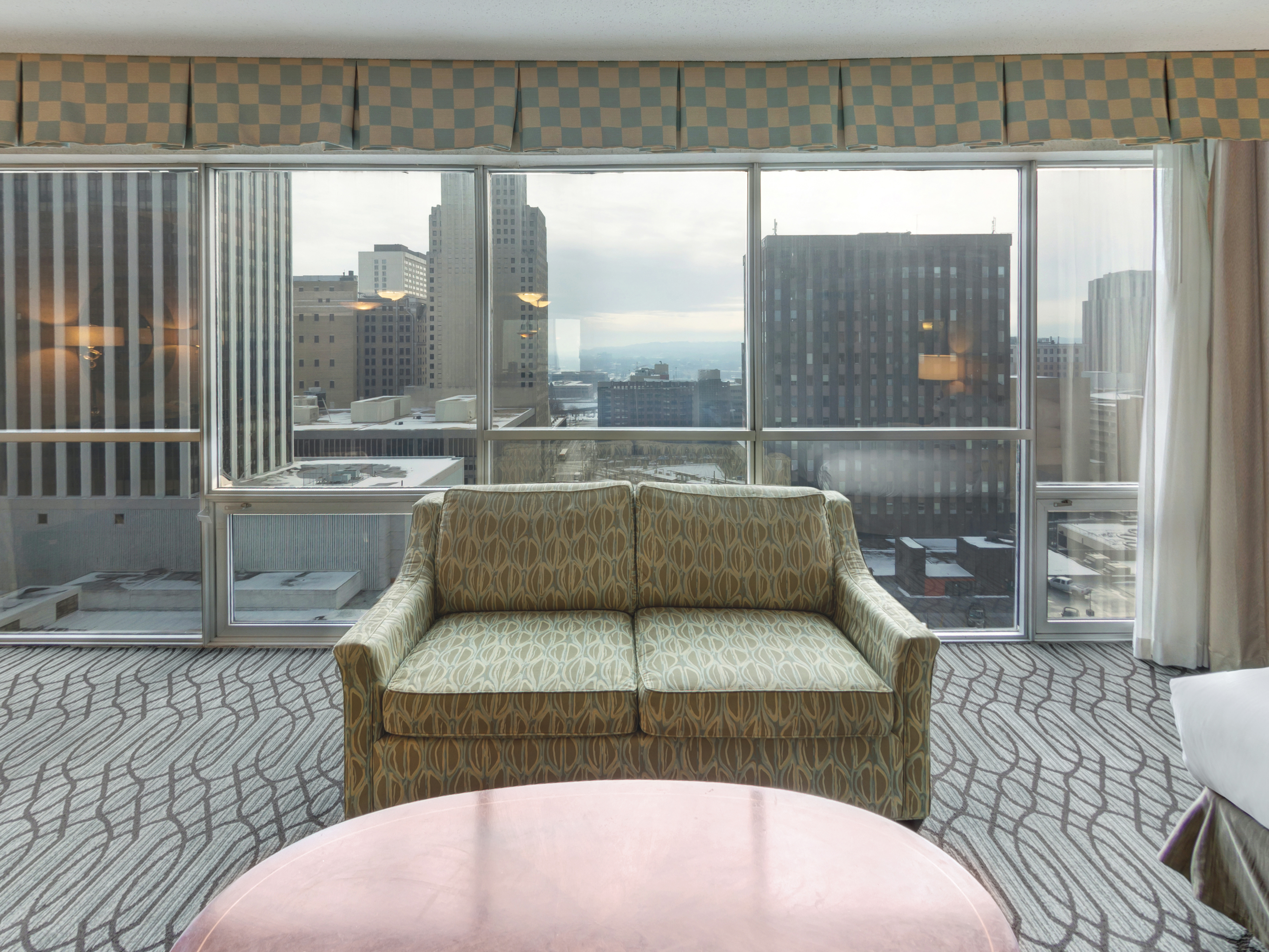 Guest Suite lounge area, window view of the city