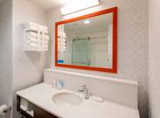Sink with mirror and towels