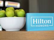 Hilton Honors Sign With Apple Display