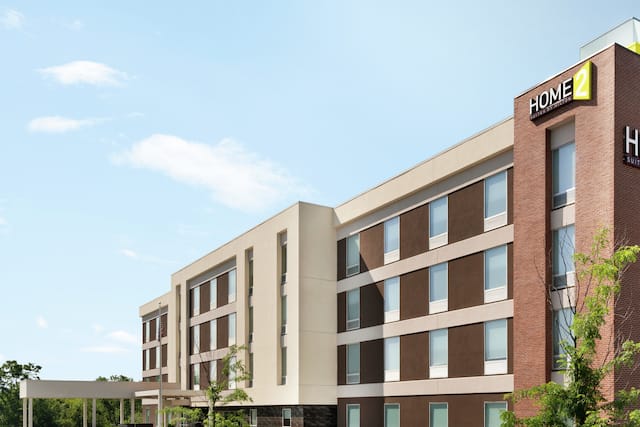 Hotel exterior with car park and entrance