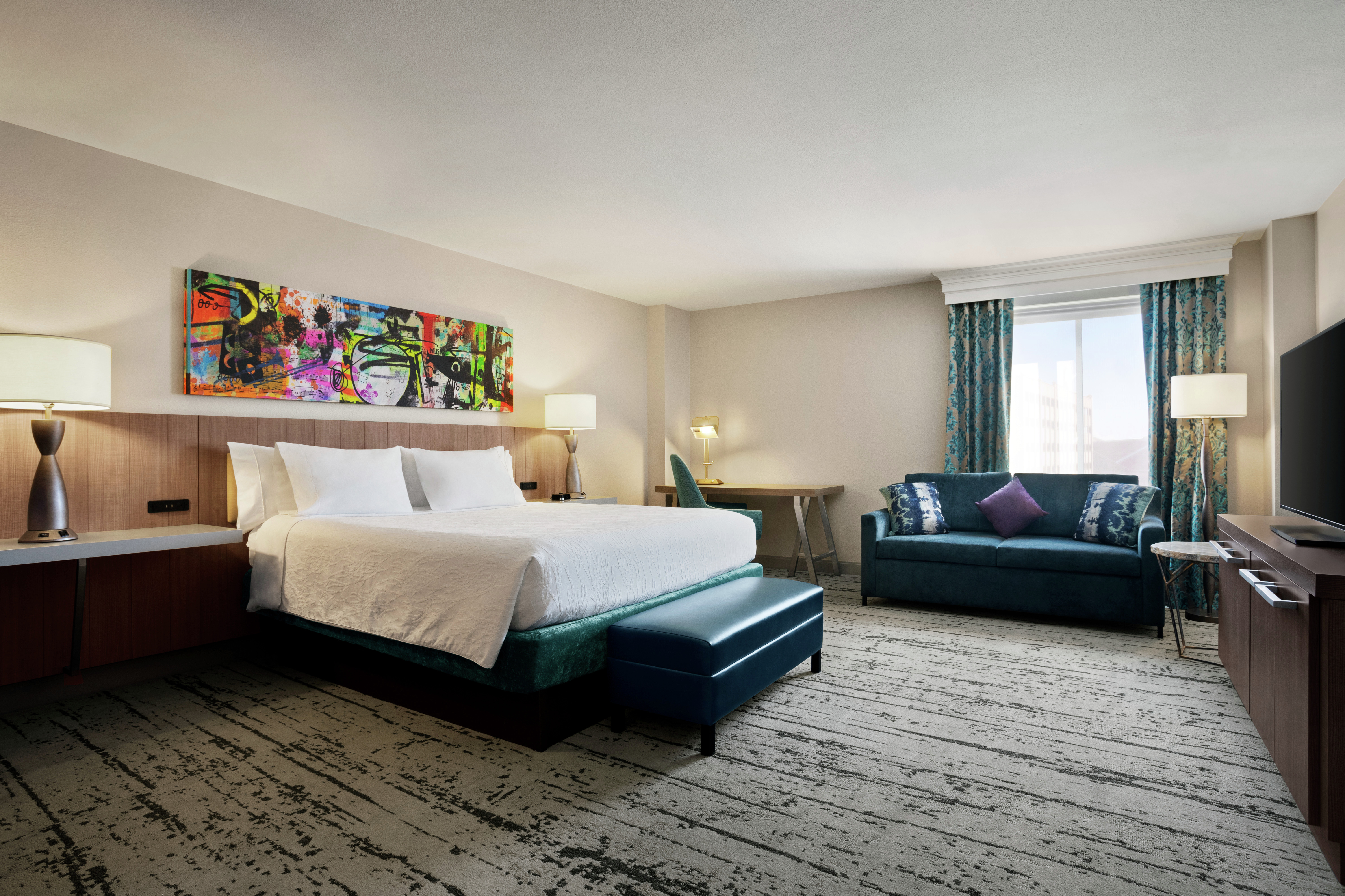 Accessible Junior Suite with King Bed, Couch, Work Desk and Television