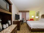 King Guestroom with Bed, Lounge Area, Work Desk, Room Technology, and Kitchenette