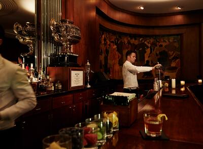 Bartender at Waldorf Astoria making a cocktail