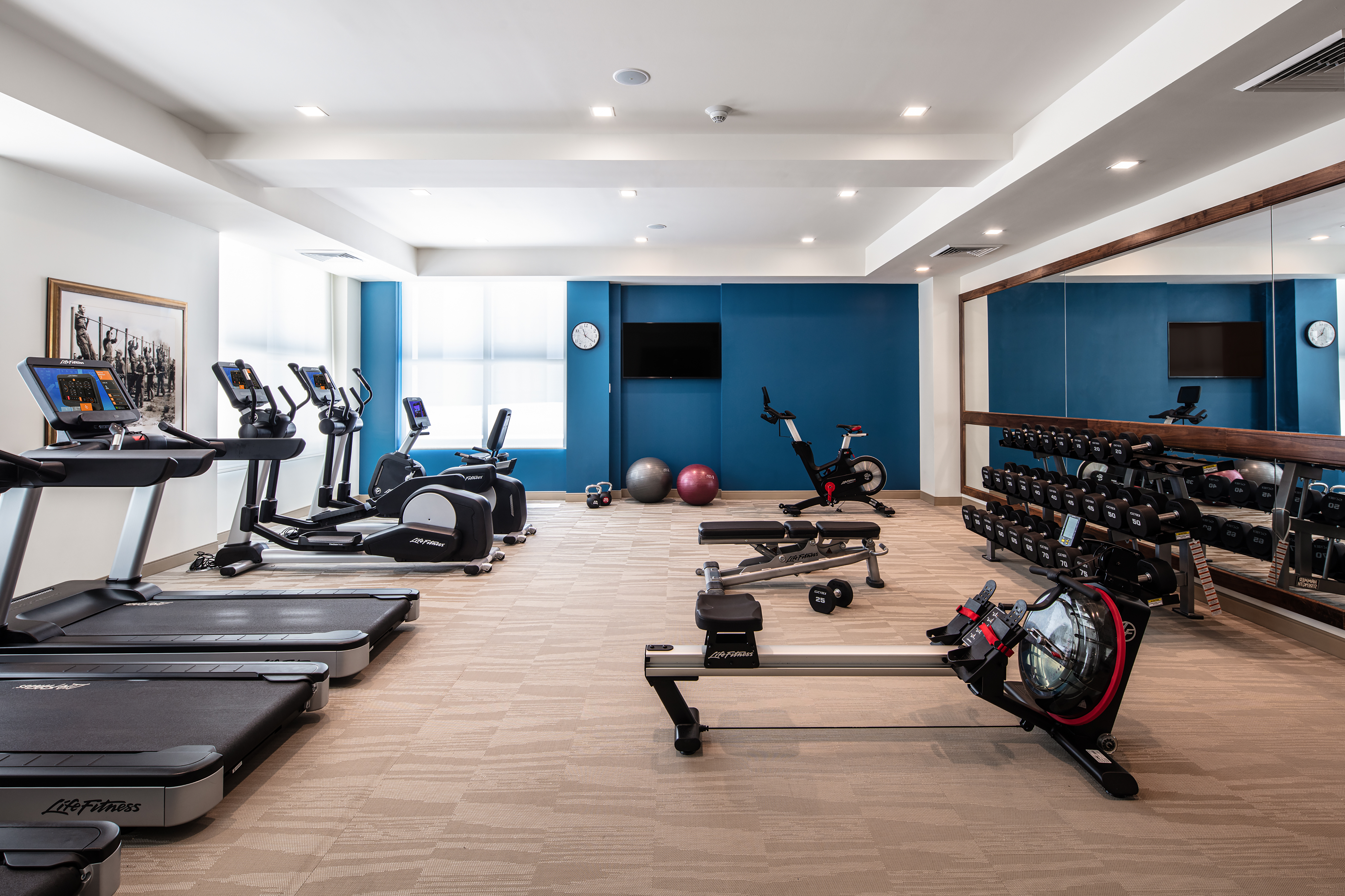 Fitness Center with Treadmills Recumbent Bikes and Weights