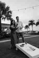 Couple Playing Corn Hole Games Outdoors