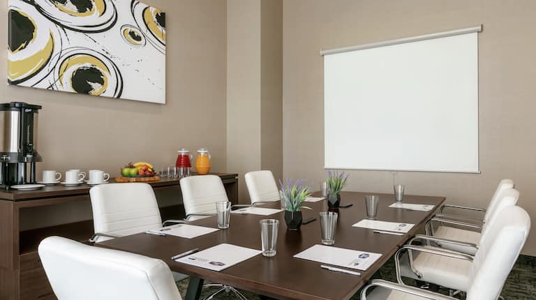 Meeting Room with Table, Office Chairs and Projector