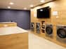 Laundry room with machines