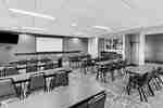 meeting room with tables and chairs