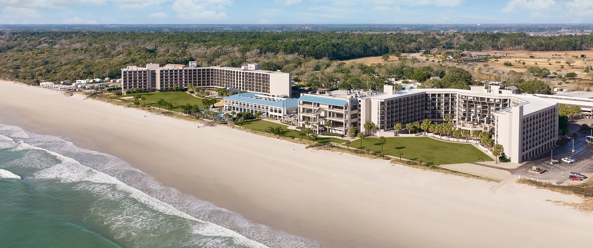 Panoramic View of Beach and Hotel Building at Daytime