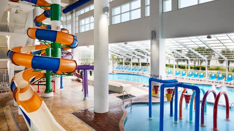 Indoor Pool Area With A Water Slide