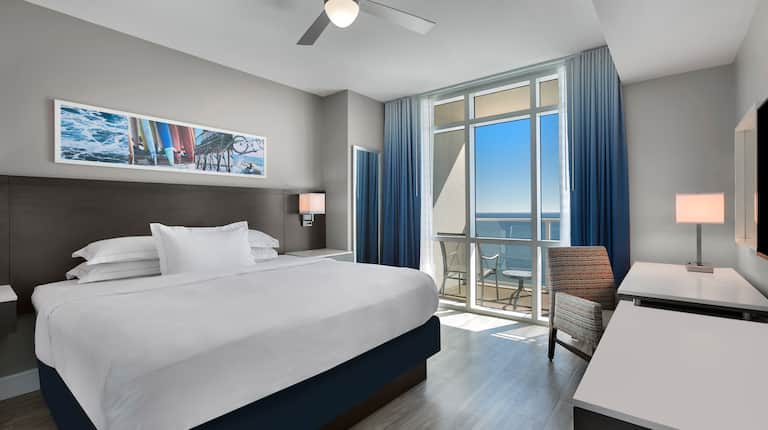 Large Bed Desk Area in Suite with Ocean View
