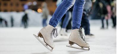 Woman Ice-Skating, Close-Up on Skates