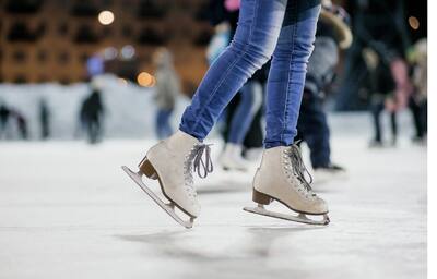 Woman Ice-Skating, Close-Up on Skates