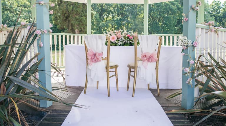 Table and Chairs Decorated for a Wedding