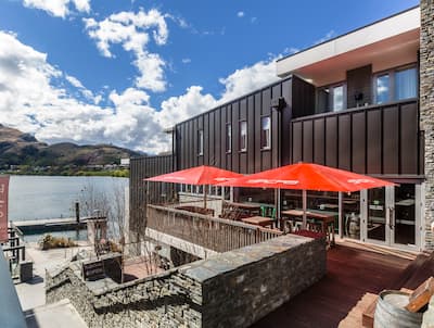 Hotel Exterior and Pub Deck with Sea and Mountain Views