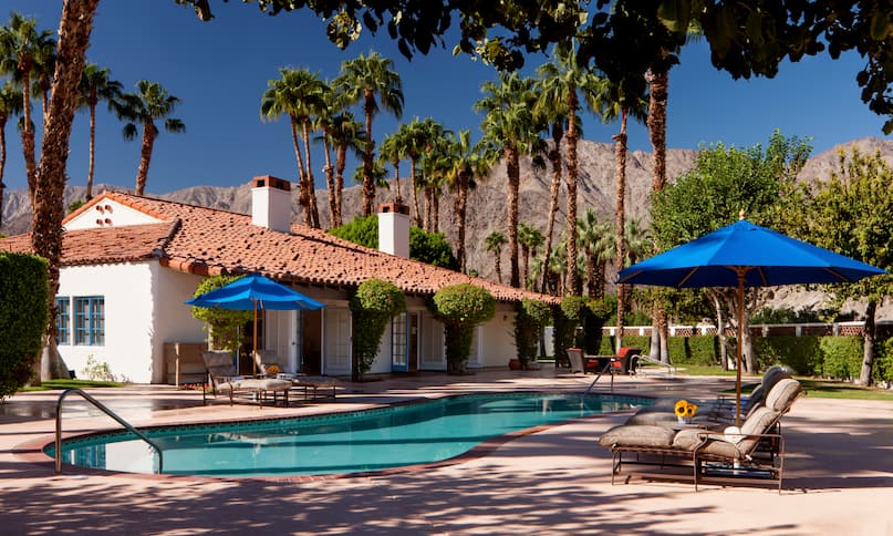 Hacienda Suite outdoor pool with mountain landscape in the distance-previous-transition