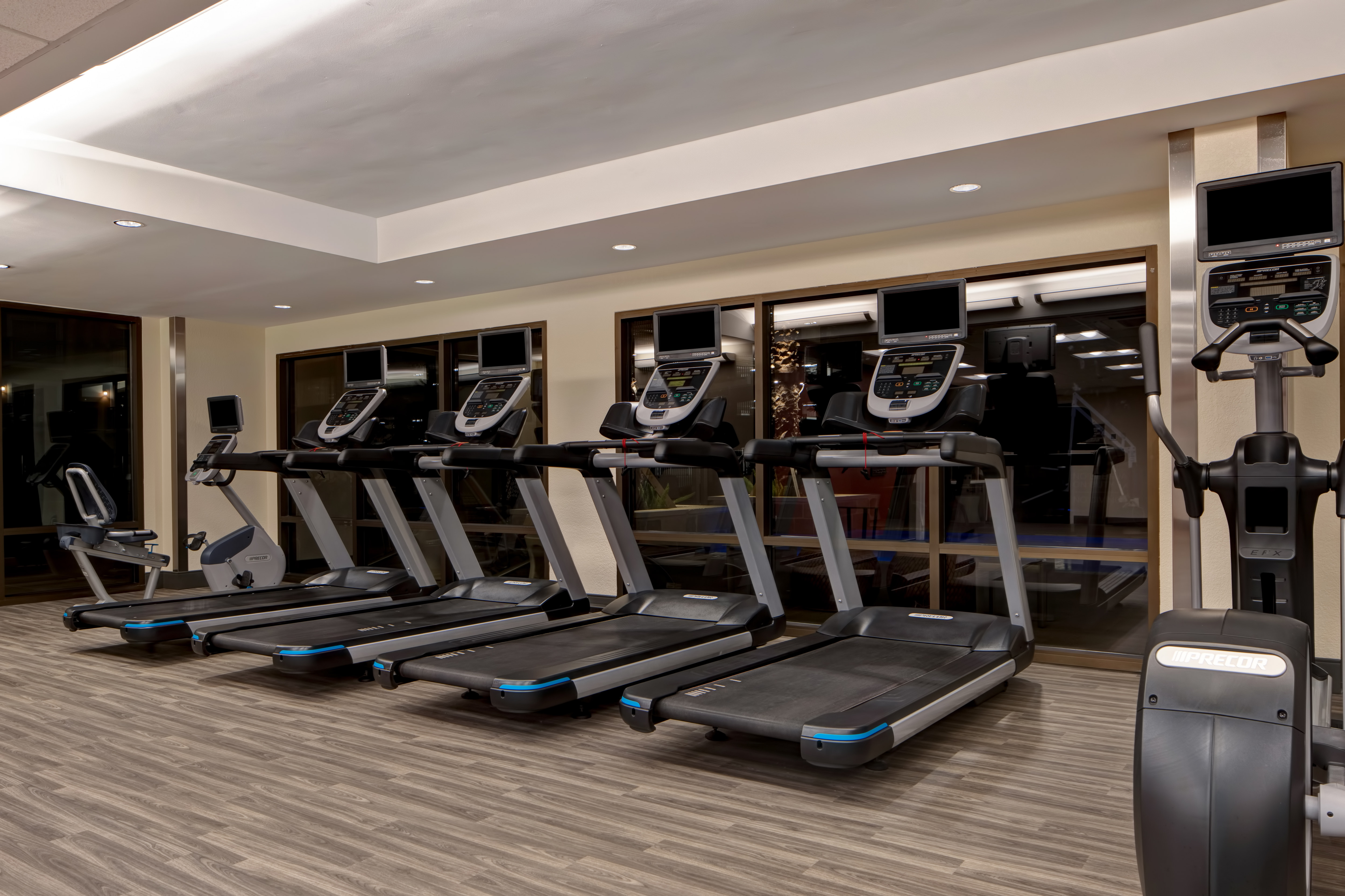 fitness center with machines and weights