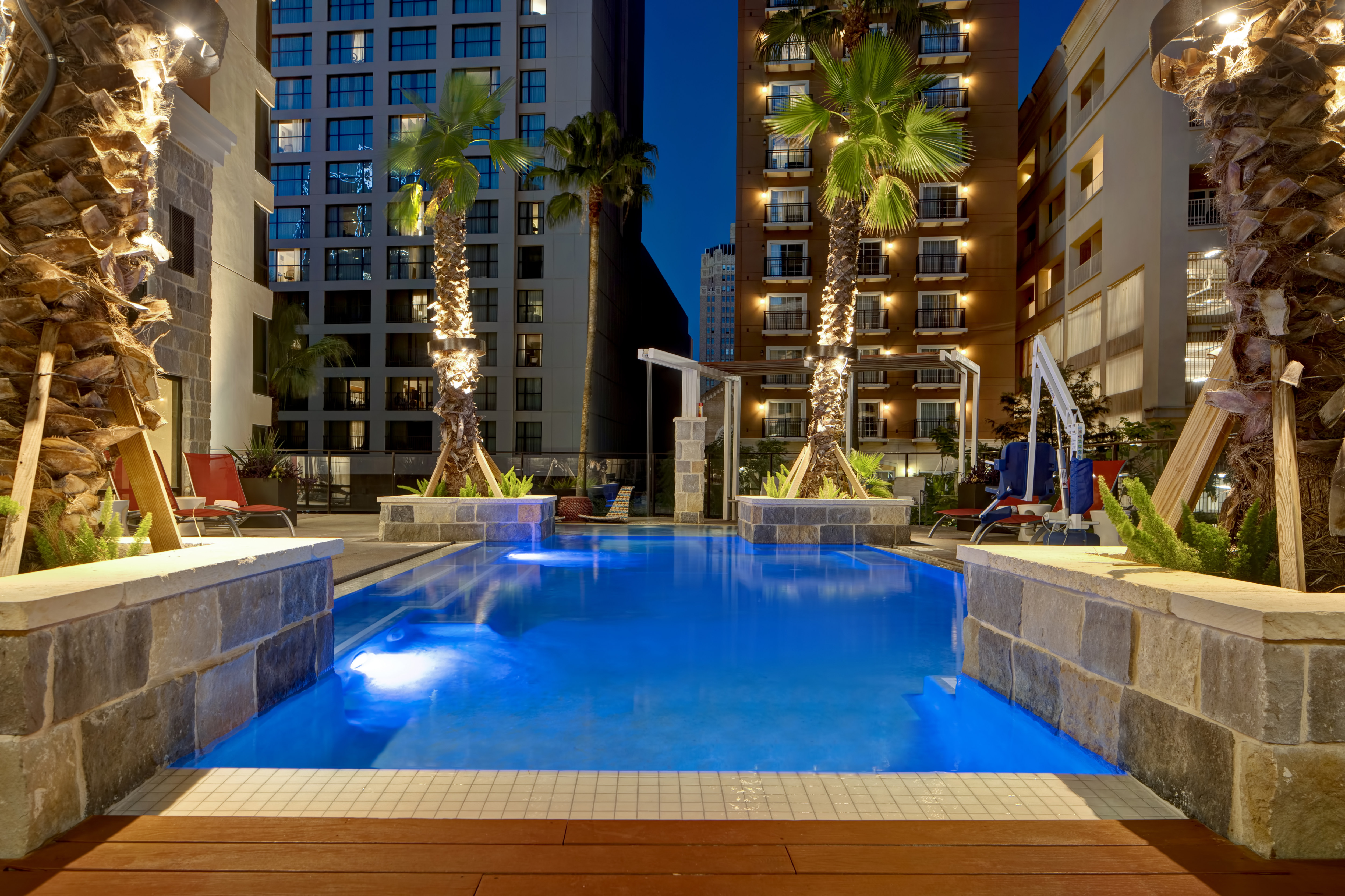 outdoor pool and patio at dusk