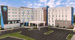 Hampton Inn and Suites Hotel Exterior Next to a Tru by Hilton Hotel