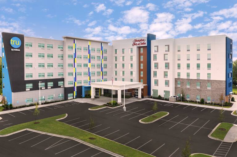 Hampton Inn and Suites Hotel Exterior Next to a Tru by Hilton Hotel