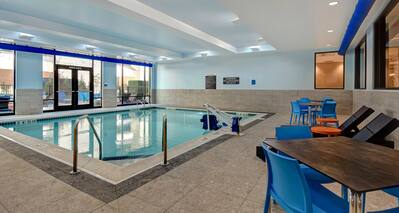 indoor swimming pool with seating