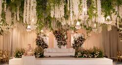 Weddings, ballroom stage with couch and hanging flowers