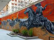 Exterior Wall Art Depicting Cowboys