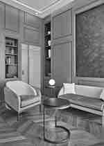 Tempat duduk nyaman di kamar dengan meja