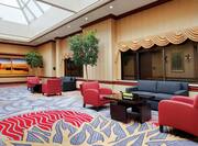 DoubleTree Hotel Prefunction Area with Armchairs, Tables, and Couches