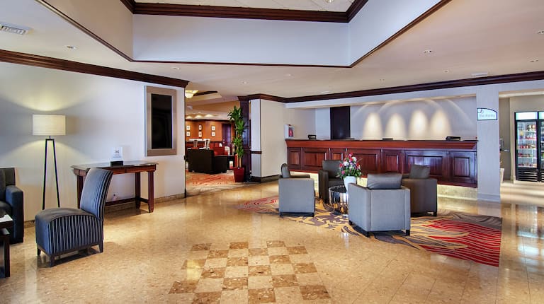 DoubleTree Hotel Lobby with Tables, Chairs, and Armchairs