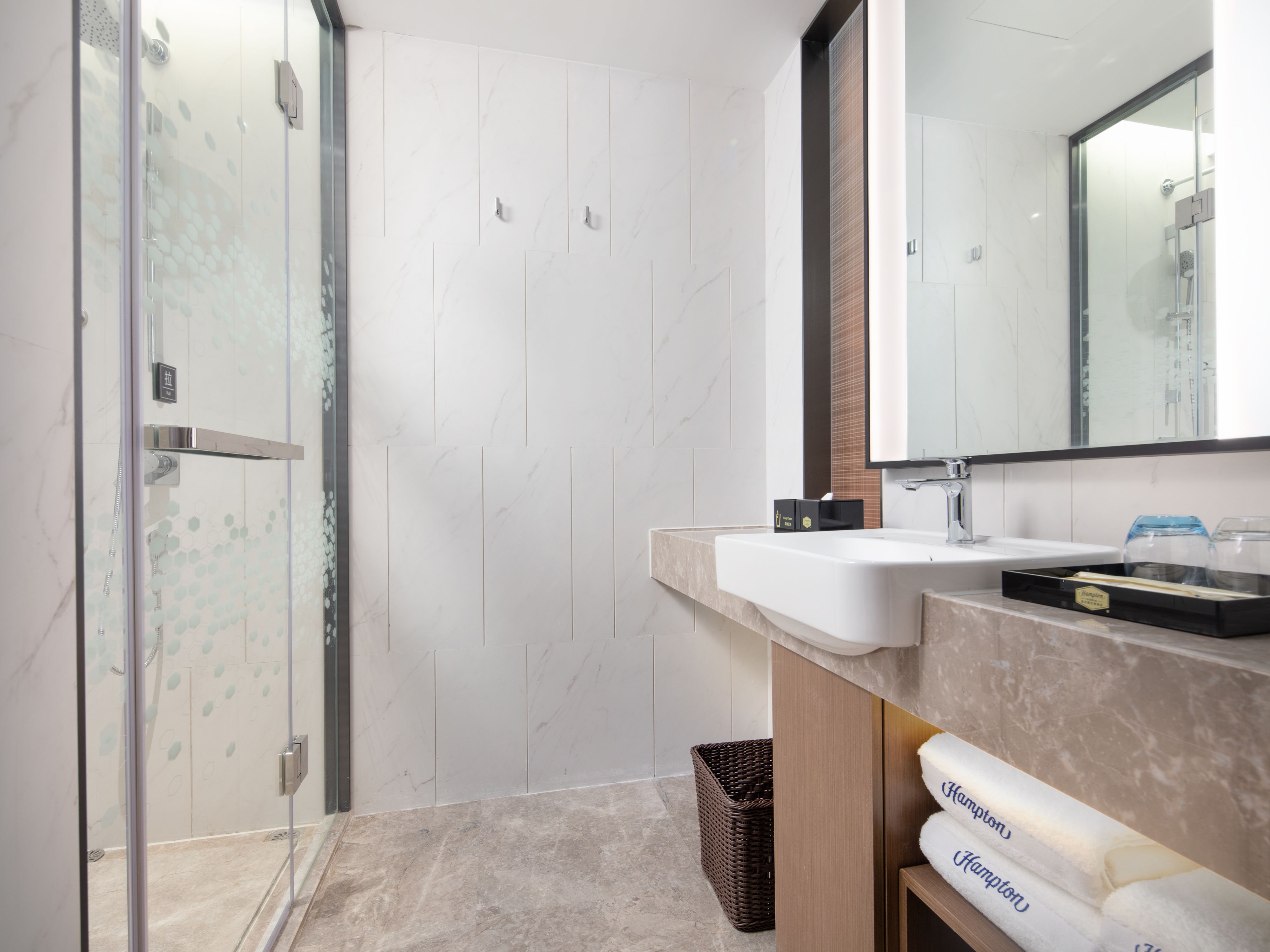 guest room bathroom vanity and shower