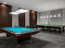 Two Pool Tables in Game Room