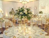Event Setup with Table and Chairs and Flower Central Piece