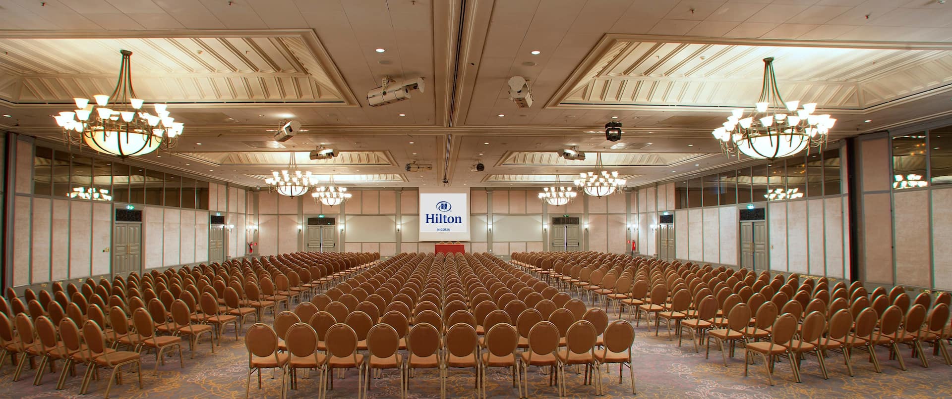 large ballroom with rows of chairs