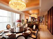 Presidential Suite Lounge Area with Dining Tables and Chairs