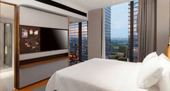 king bedroom with view of city